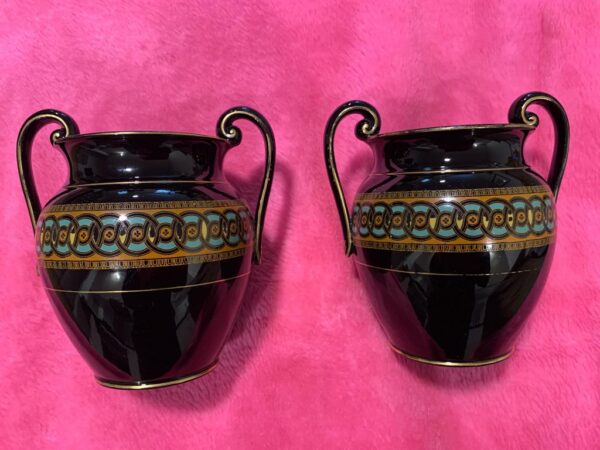 Pair Jackfield ware double handle vases, polychrome and gilt decoration, painted marks 8/50, Circa 1860