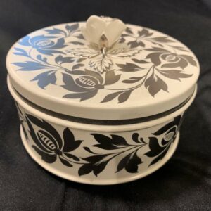 Wedgwood, circular covered box, floral finial, moonstone body, floral platinum lustre decoration, design by Millicent Taplin, circa 1950